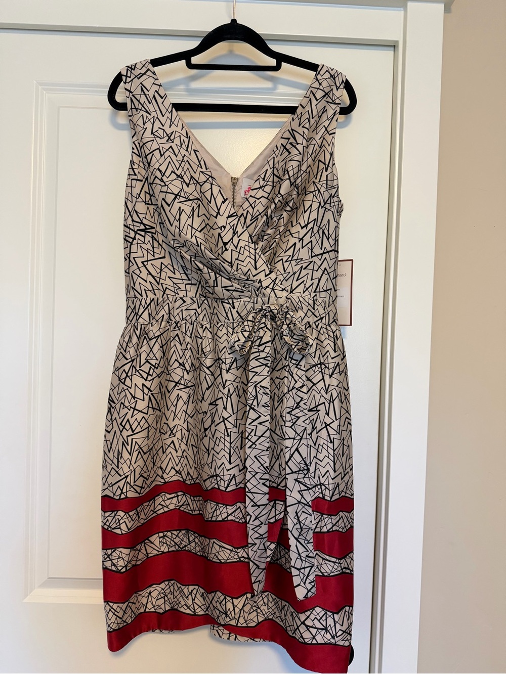 CeCe Cream Faux Wrap Dress with Black Geometric Print & Red Stripe Hem NWT